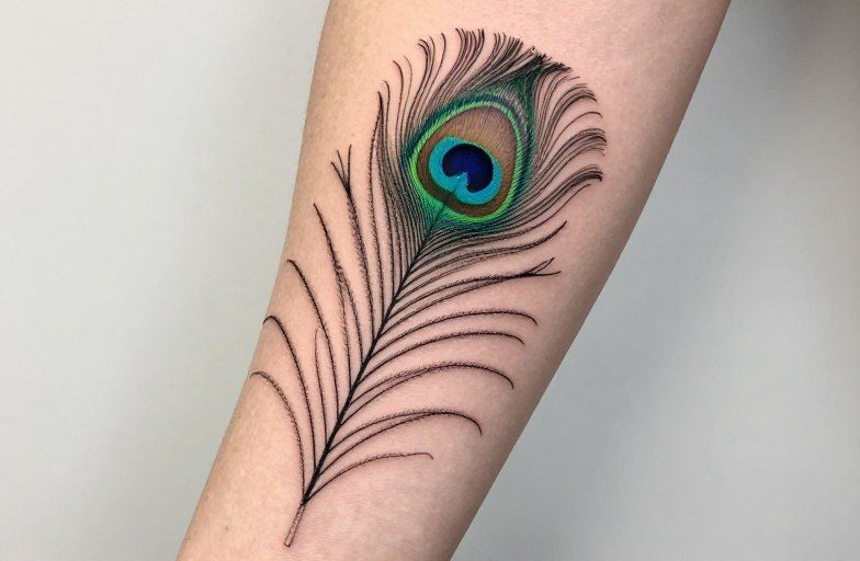 peacock-feather-tattoo-meaning-symbolism-038-design-guide
