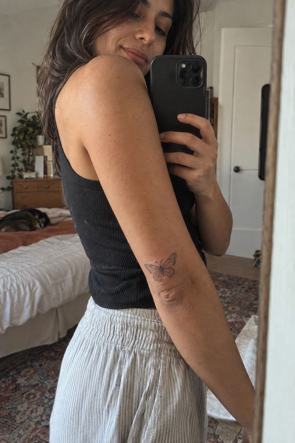 Playful Micro Butterfly Tattoo Behind The Arm