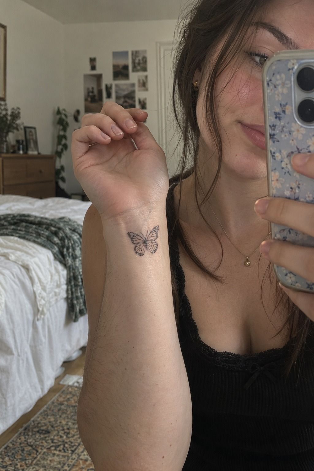 Choose a Tiny Black Butterfly Tattoo on the Wrist
