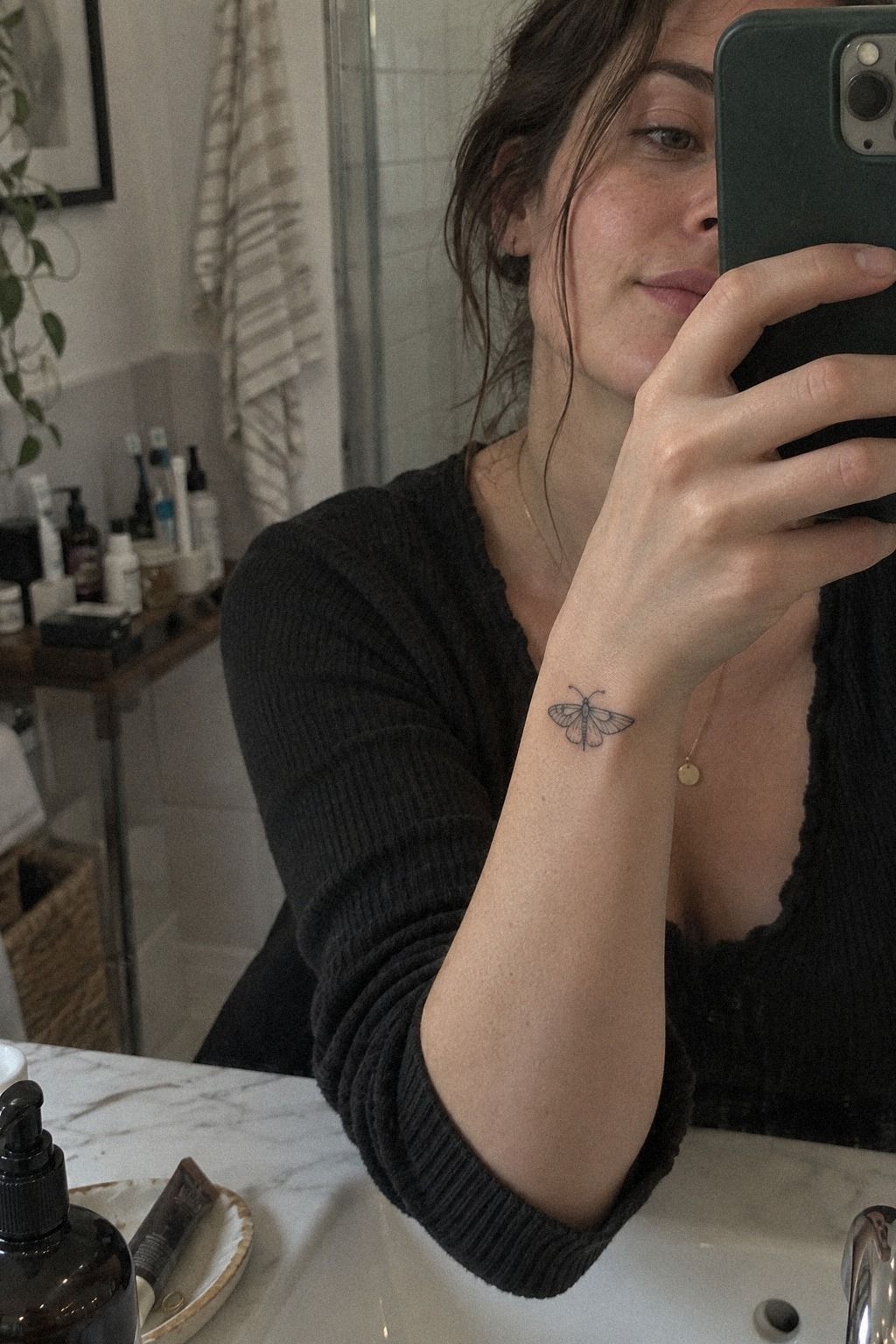 Small Minimalist Moth Tattoo on the Wrist